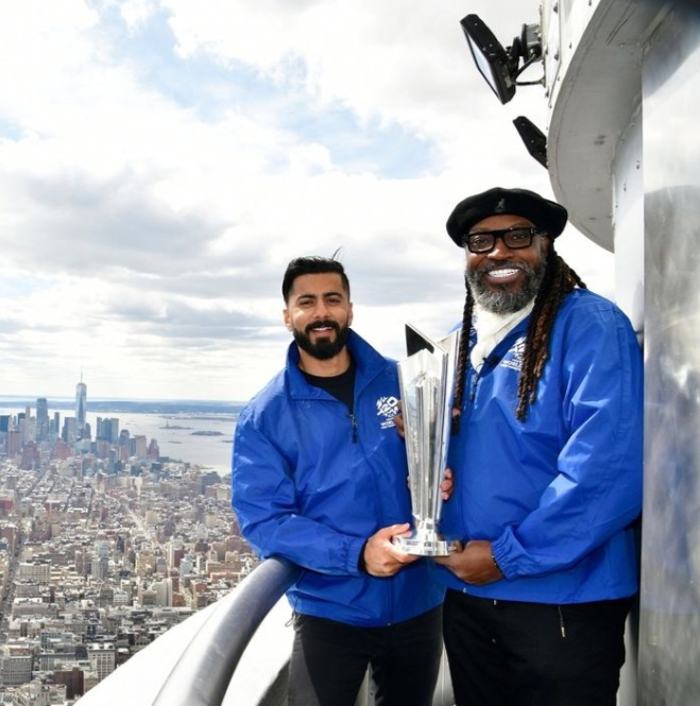 Ali Khan With West Indies Cricketer Chris Gayle Posing With T20 World Cup Trophy